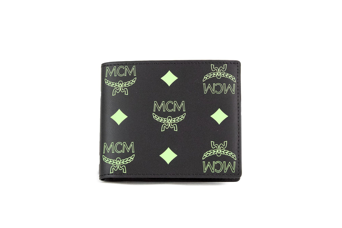 MCM Kleines, zweifach gefaltetes Portemonnaie aus glattem Visetos-Leder mit Monogramm-Logo in Schwarz und Sommergrün